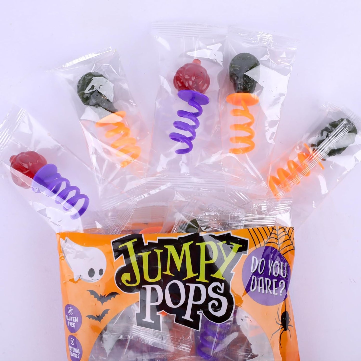 Jumpy Pops Halloween Lollies 140g – Sucettes sucrées en forme de tête de mort & sorcière avec ressort à enrouler autour des doigts – Cadeaux de fête, Trick or Treat, anniversaire & bonbons déco